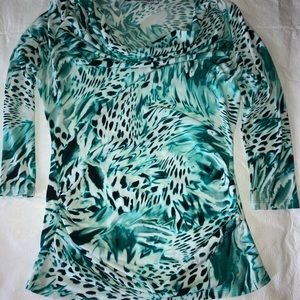 Jennifer López Teal/Green Blouse.